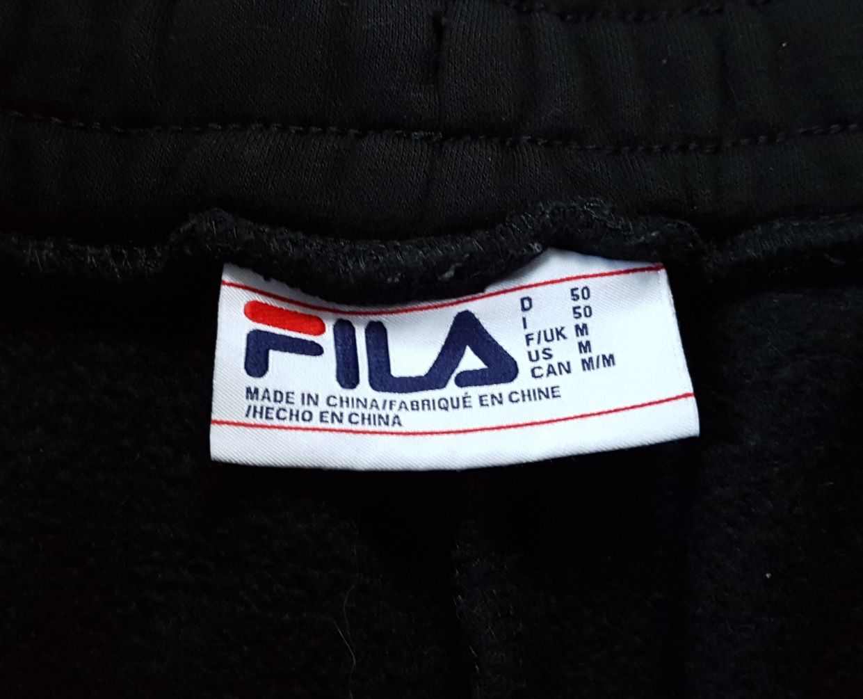 Fila M штани спортивні джогери оригінал з лампасами на кишенях