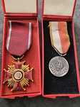 Zestaw PRL: Krzyż Zasługi, medal, moneta 50k, przypinka