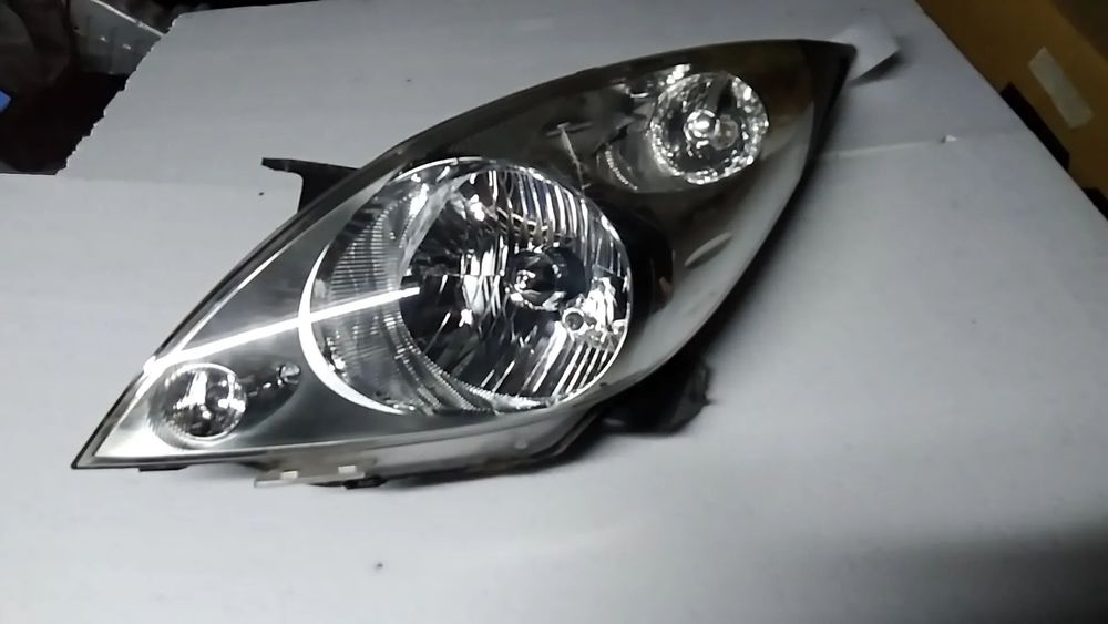 CHEVROLET SPARK M300 REFLEKTOR LEWY LAMPA PRZEDNIA 10-