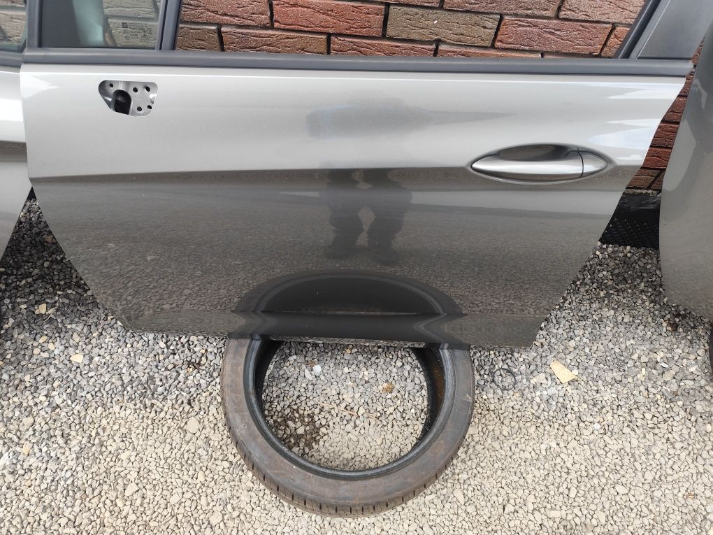 Drzwi lewy przód tył przednie tylne opel astra k kombi z10a