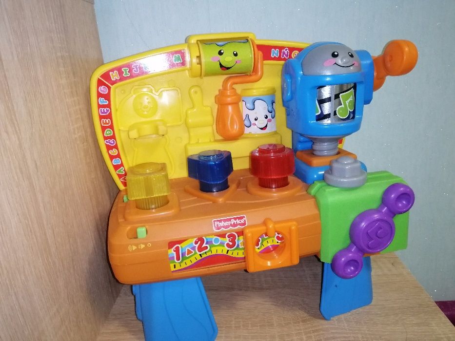 Музыкальный станок плотника Fisher-Price интрактивная развивающая