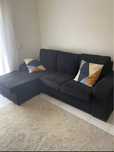 Sofá preto com chaise long