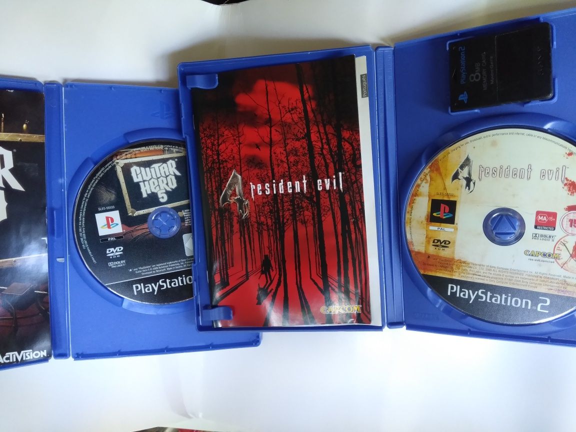 Jogos PlayStation resident evil e guitar hero e NBA e caixas