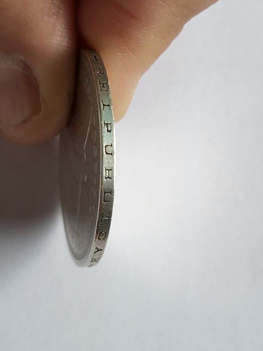 Srebrna moneta Nike 1928 TYP A ze znakiem mennicy.