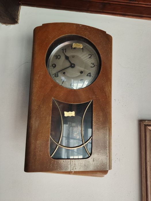 Relógio de parede reguladora