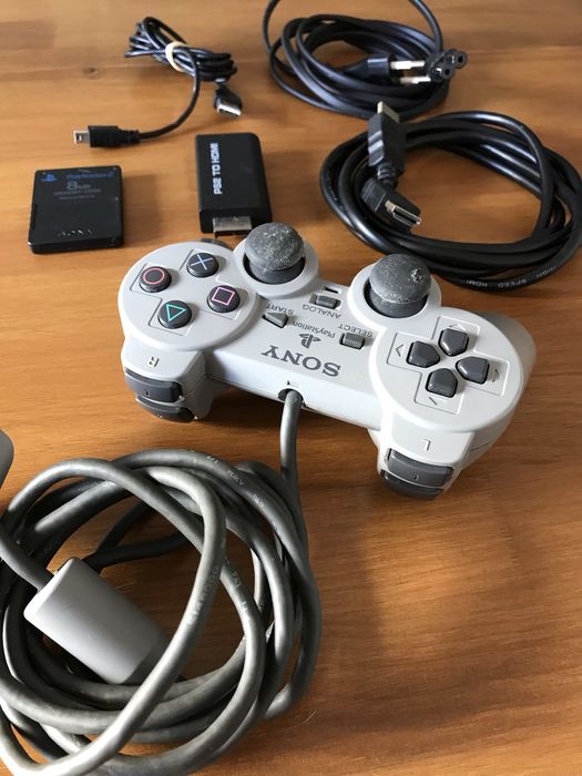 PS2 fat + comando + jogos