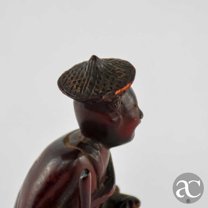 Figura de homem, China, em madeira exótica