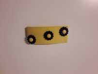 Gancho amarelo com flores