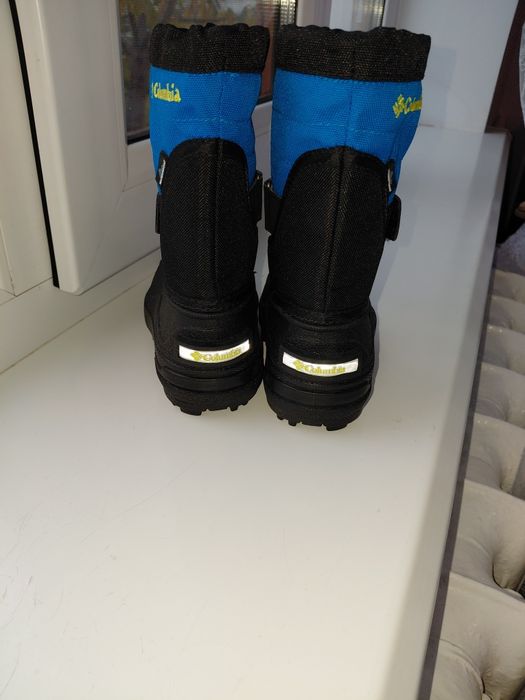 Пуховий комбінезон та чоботи Columbia