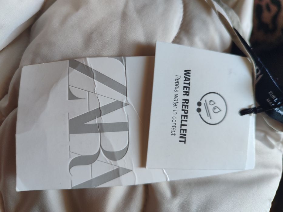 Куртка , сіро кремового кольору