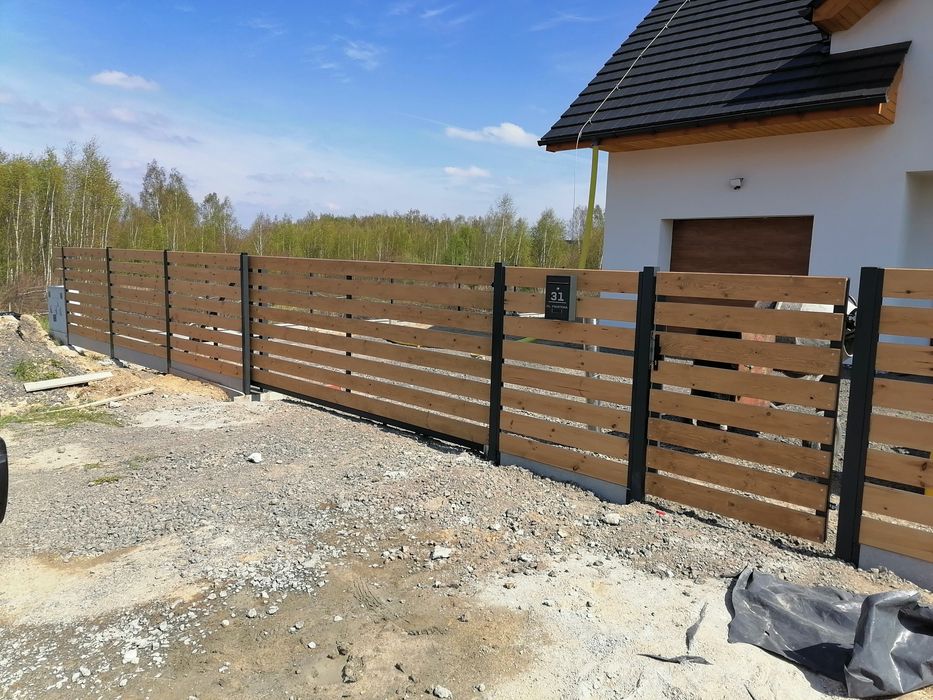 Bramy przesuwne z wypełnieniem panelowym lub drewnianym