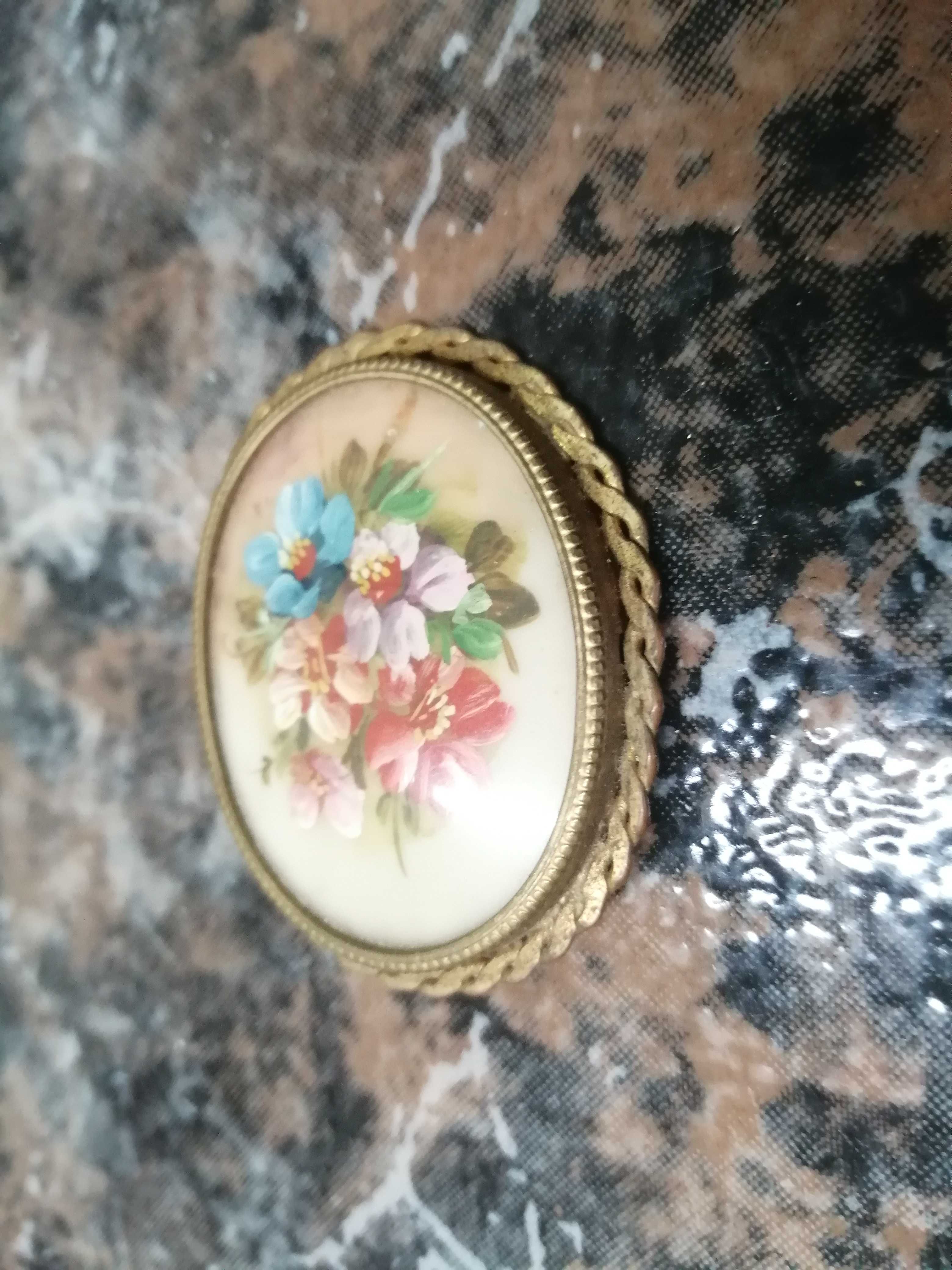 alfinete de peito antigo