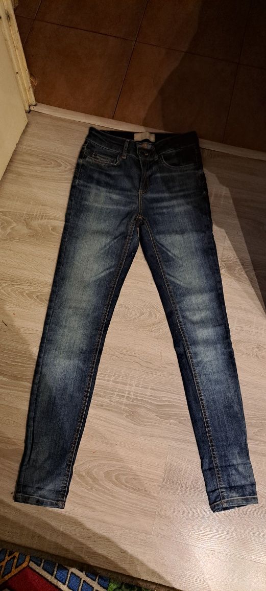 Spodnie jeans 34