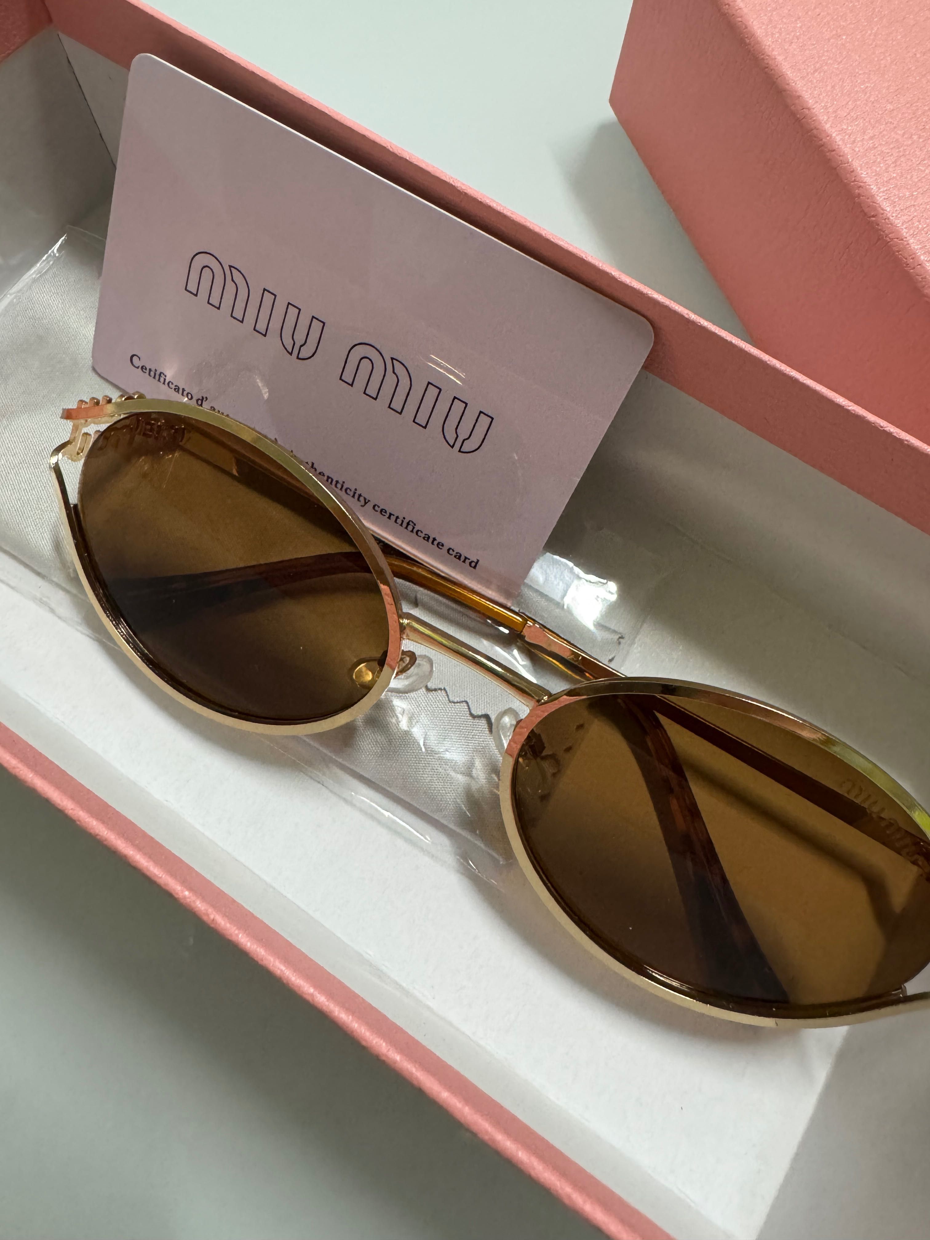 Óculos de sol  miu miu