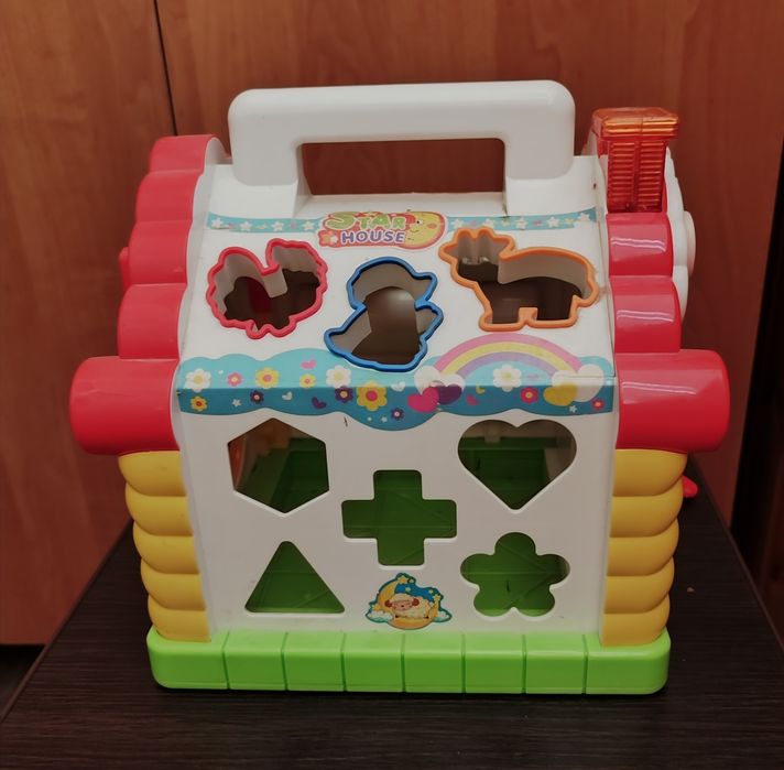 Дитячий розвиваючий, музичний будиночок сортер.