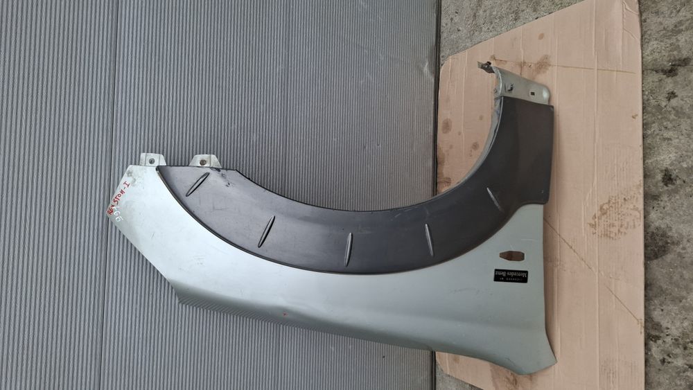 Ssang Yong Rexton 01-06 крило переднє RH, праве, з аркою KL