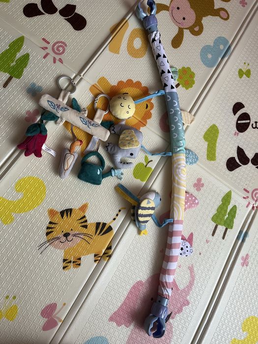 Дуга брязкальце на коляску