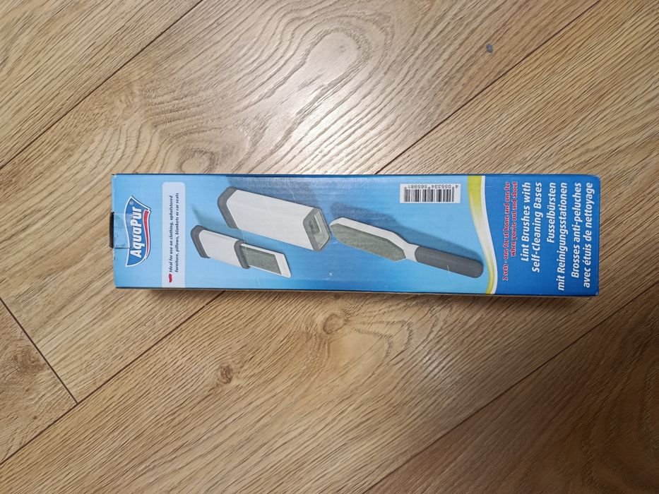 Щітка для чищення одягу