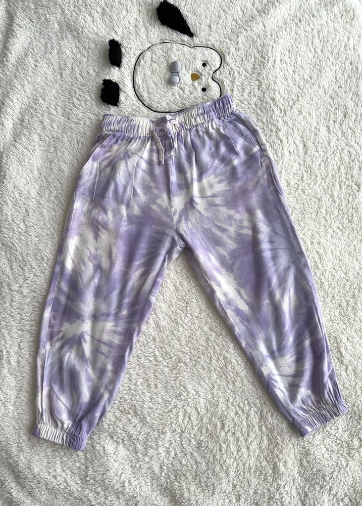 H&M Joggersy tkaninowe z wiskozy 98 dziecięce fioletowe Tie-dye