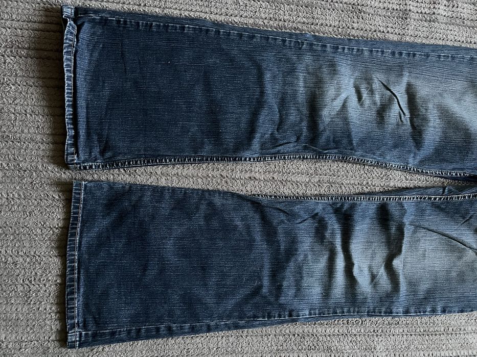 Opium клеш flered jeans темно сині