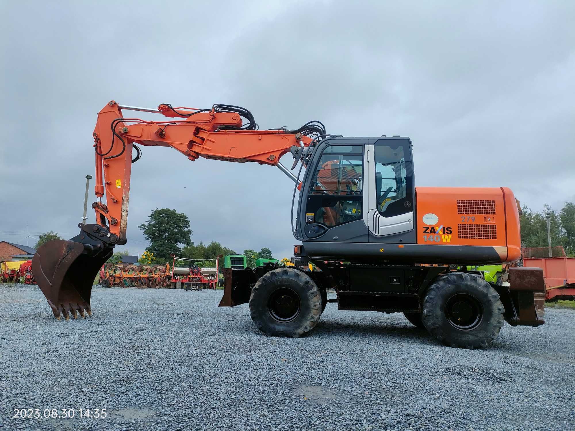 Koparka kołowa Hitachi Zaxis 140 W(cat,liebherr) W rok 2011