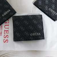 РОЗПРОДАЖ гаманців Guess