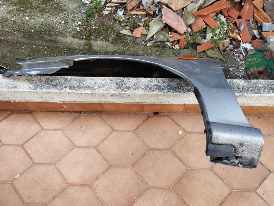 guarda-malas Nissan Almera II hatchback 1.5 dci