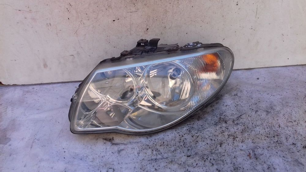 LAMPA LEWY PRZÓD PRZEDNIA 04857833AB CHRYSLER VOYAGER IV LIFT 05-07