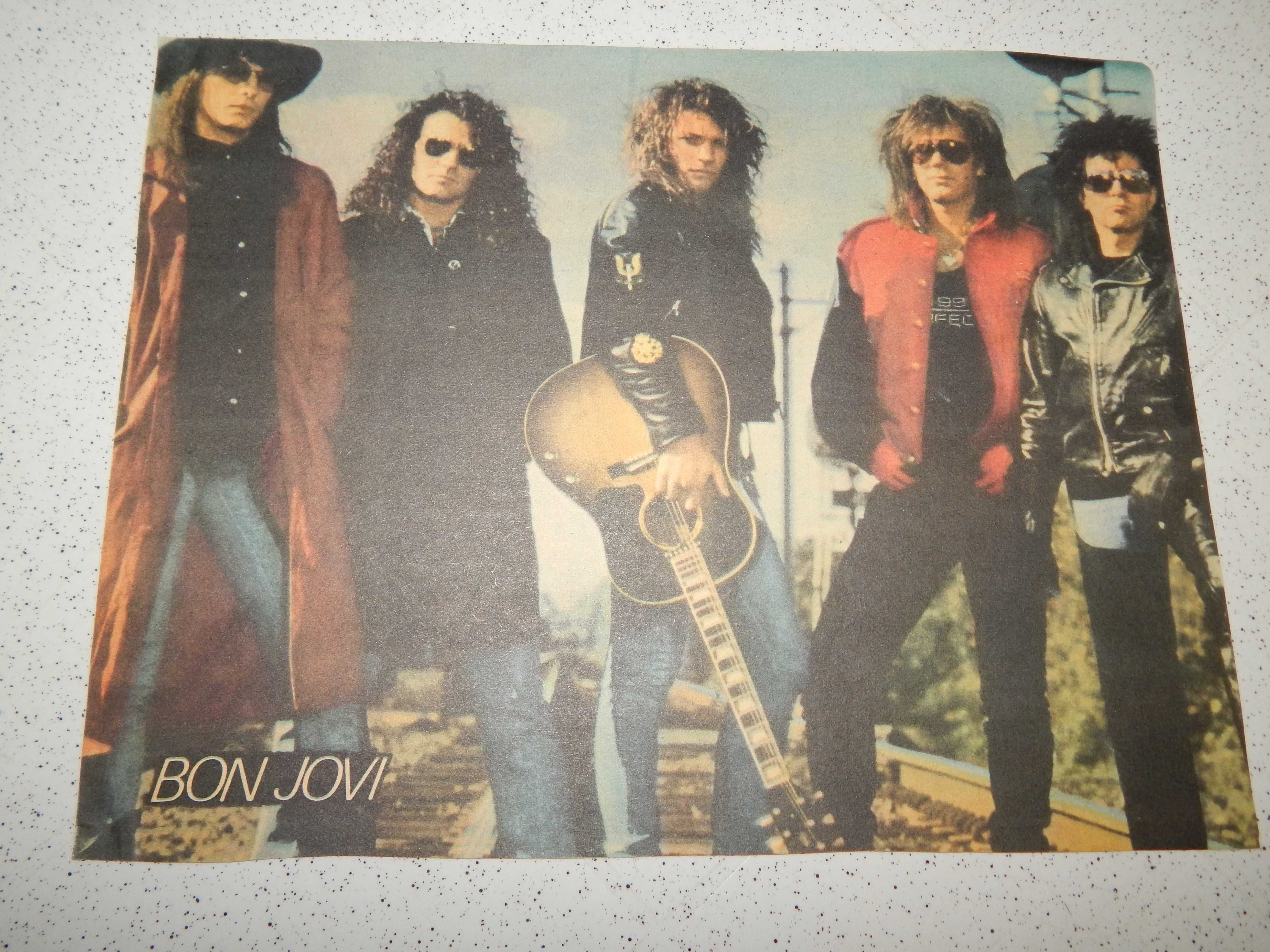 Постеры Bon Jovi, постер и вырезки Guns-N-Roses.