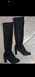 Botas acima do joelho