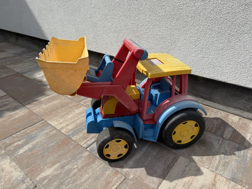 Pojazd koparka plastikowy