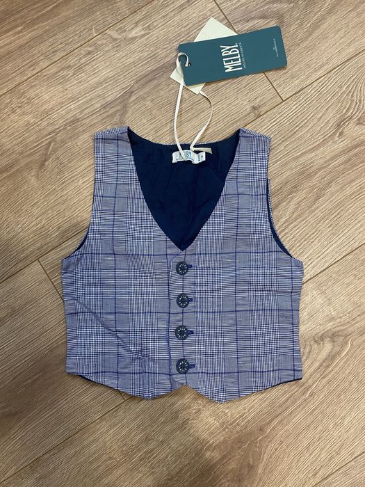 Дитячий одяг/безрукавки