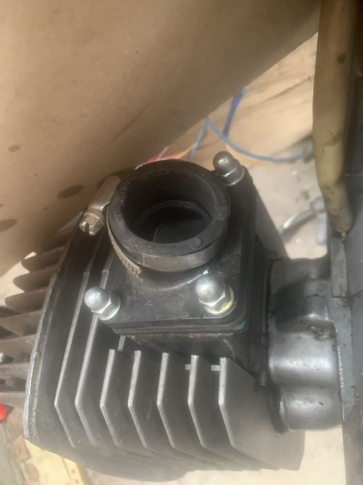 Лепестковый клапан