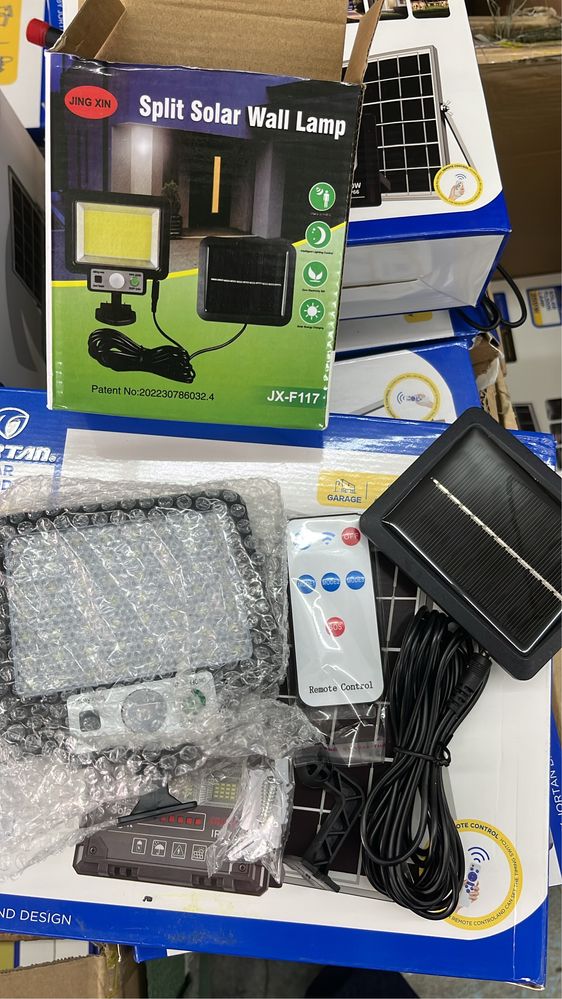 Holofote a bateria com painel solar e comando