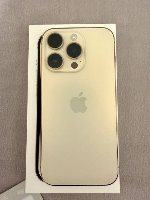 Sprzedam Iphone 14pro 256gb gold idealny