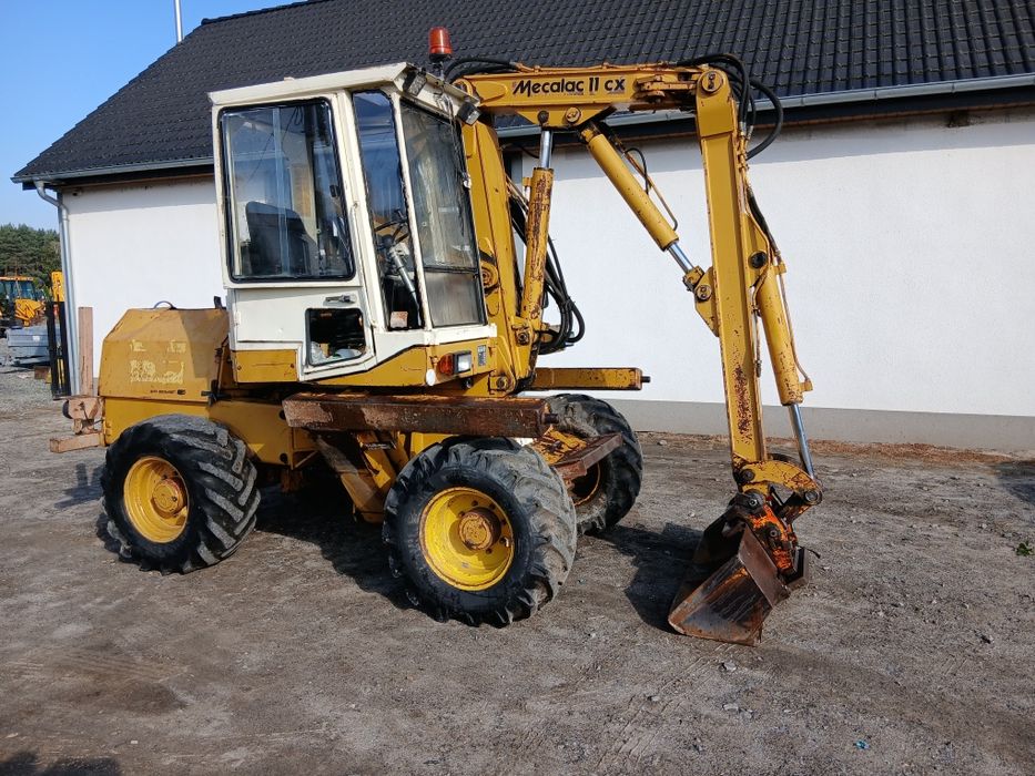 Mecalac 11CX 4x4 oryginal bardzo dobrym stanie koparko ładowarka 12mxt