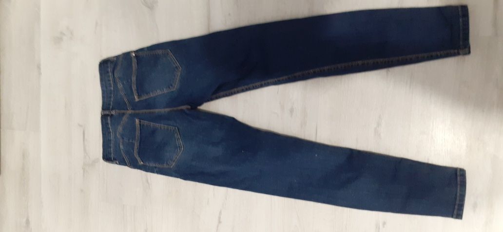 Spodnie jeans sinsay push up 32