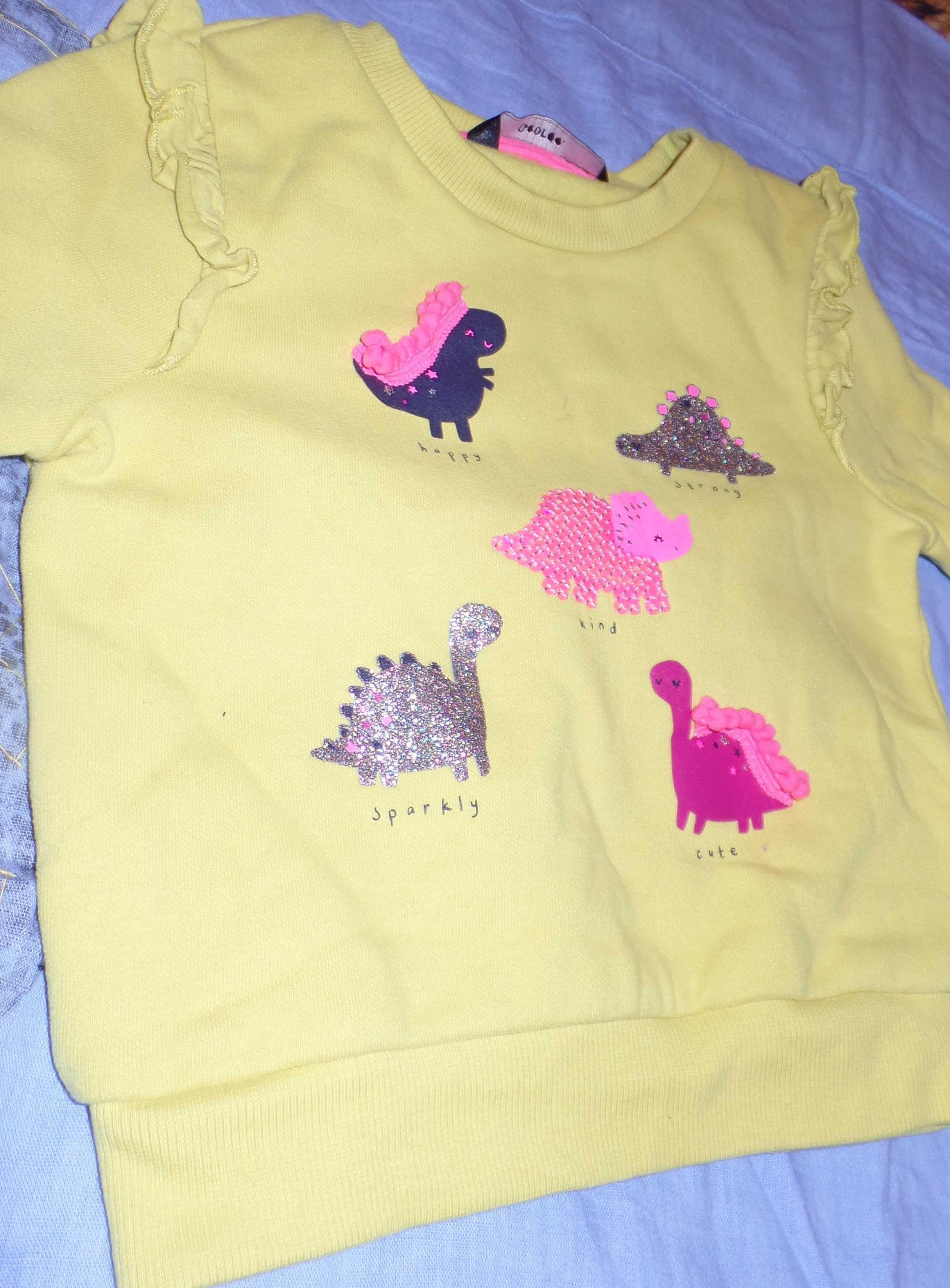 Żółta bluza dla dziewczynki z kolorowymi dinozaurami