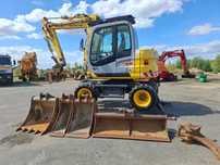 New Holland MH2.6  Koparka kołowa NEW HOLLAND MH 2.6 2011r 3 łyżki klima sprowadzona