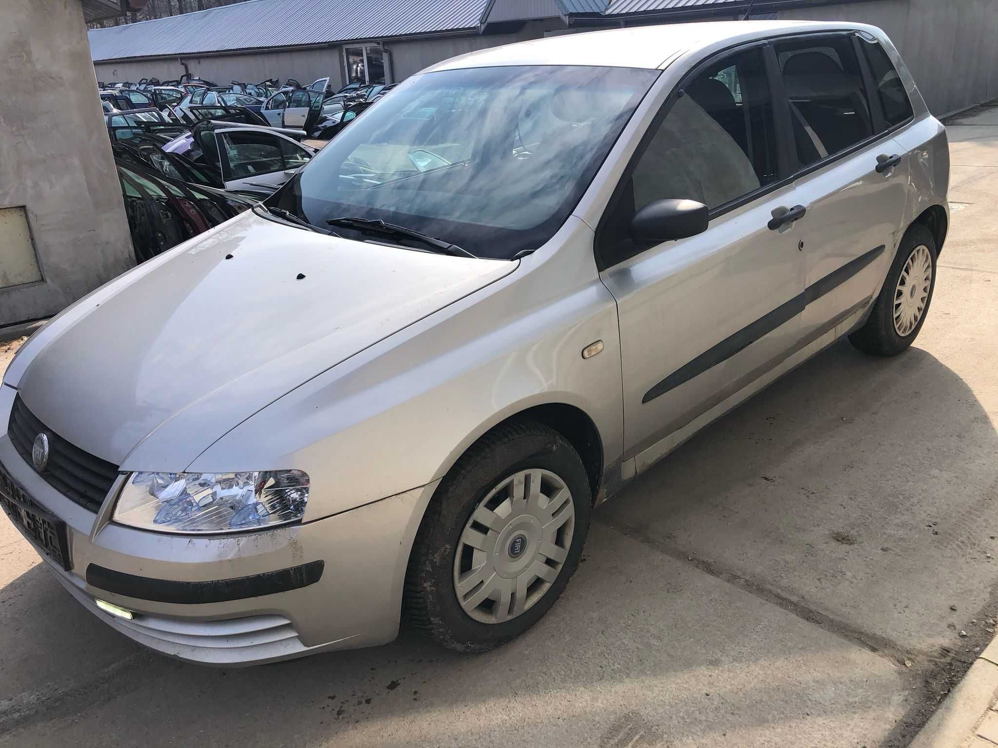 Fiat Stilo na części silnik 1.9jtd  silnik/skrzynia/belka/drzwi/lampy