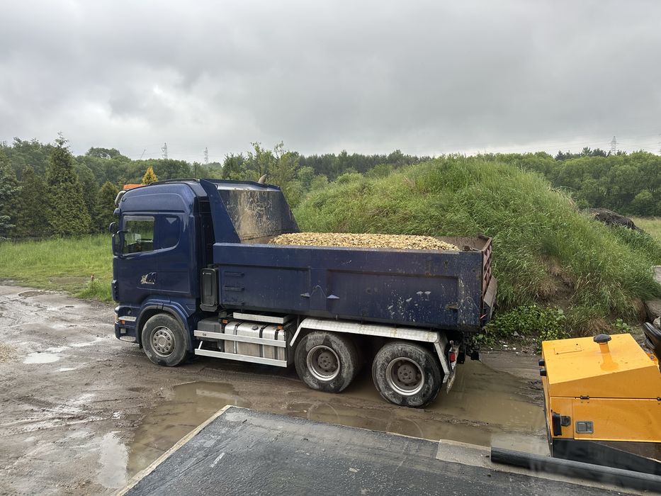 Usługi transportowe materialów sypkich oraz niskopodwoziowy