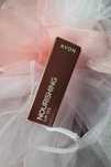 Odżywczy olejek do ust Shimmering Petal 7ml Avon
