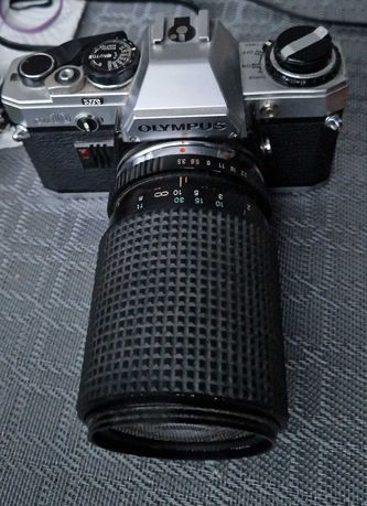 aparat Olympus OM-10 35mm  TOKINA AT-X 28-85/3.3-4.5