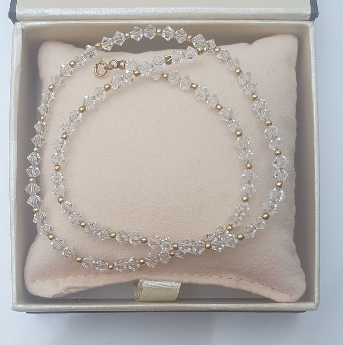 Kolia Swarovski ze zlotem 18 karatow