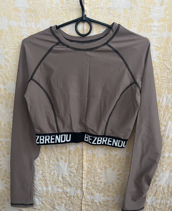 Топік новий  р. L, на резинці.