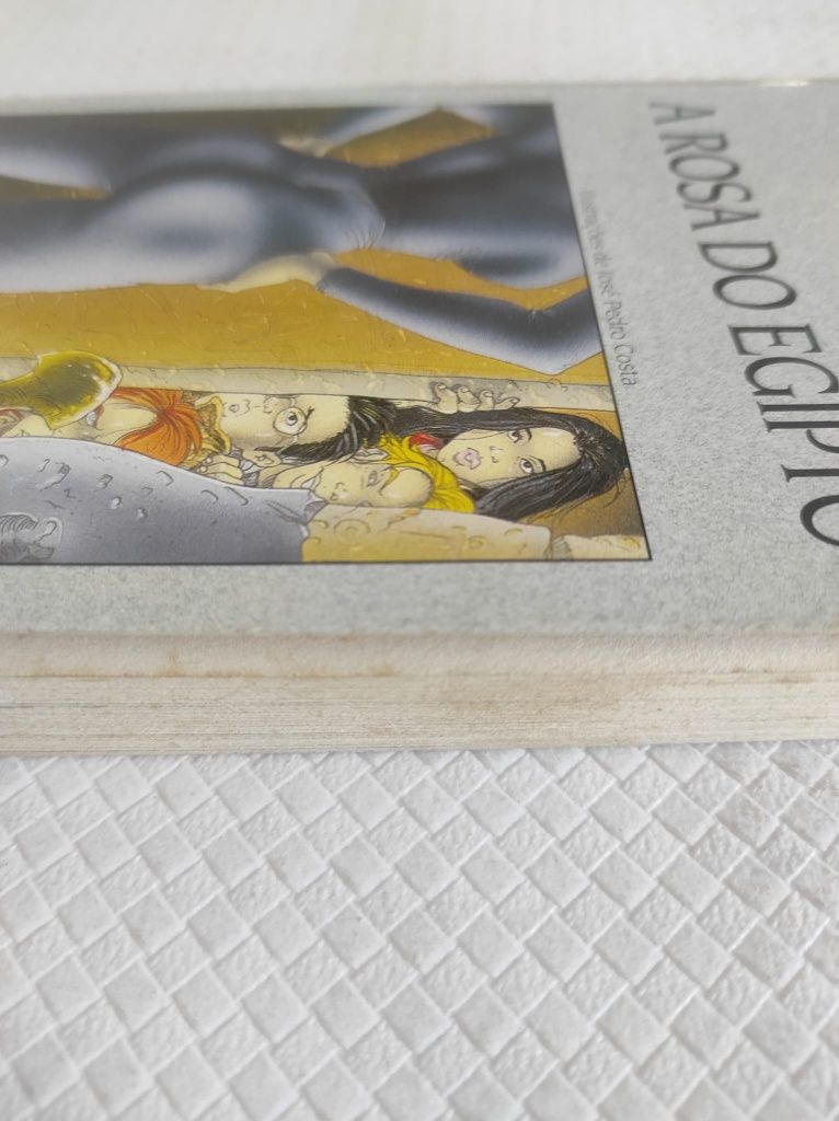 Livros triângulo jota