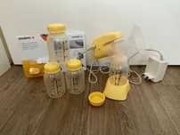 Extrator de leite MEDELA mini eletric com vários acessórios