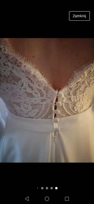 Piękna,skromna, klasyczna suknia ślubna z długim rękawem i kieszeniami