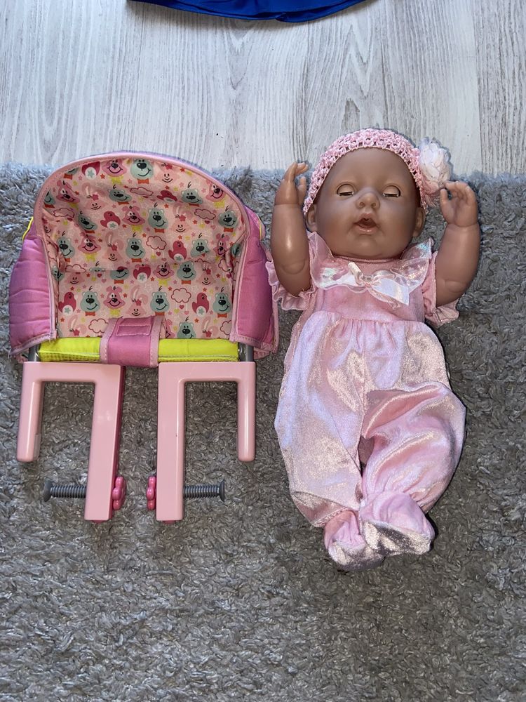 Mówiąca lalka hiszpanska Berenguer i krzeselko do karmienia Baby Born