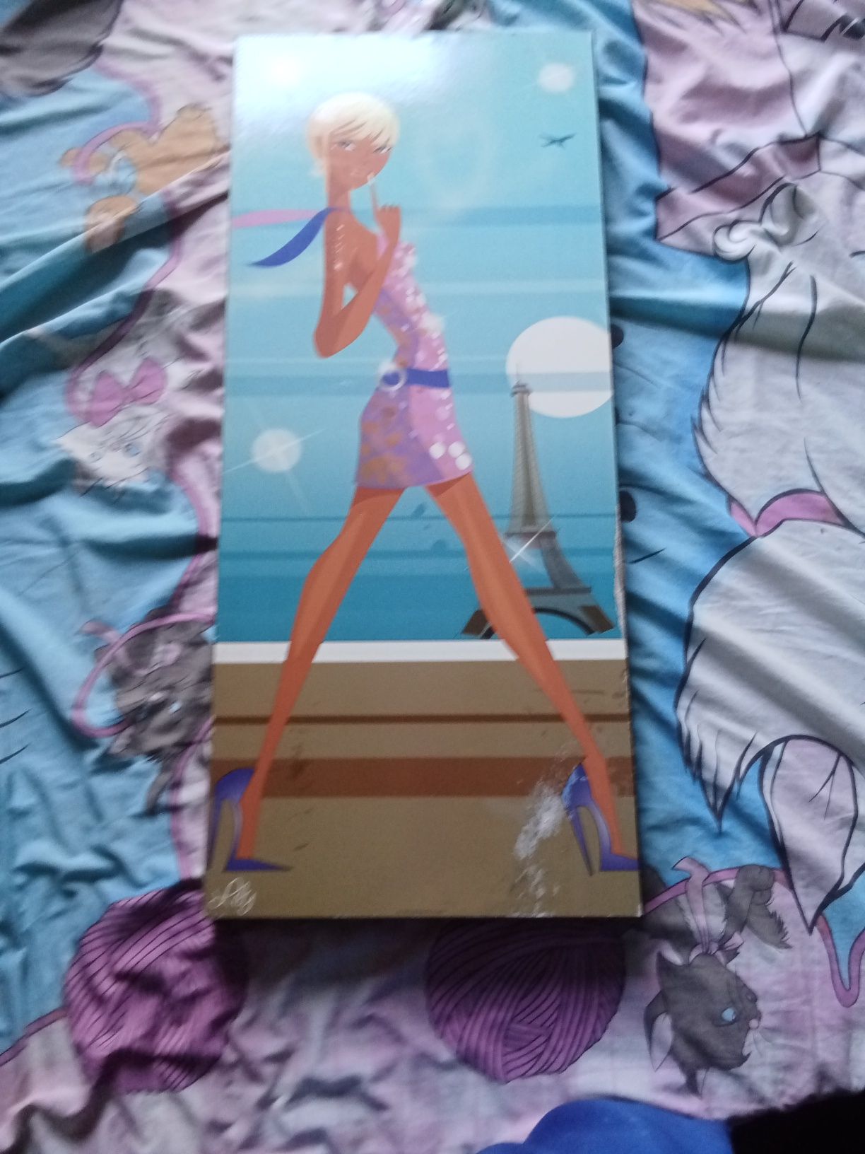 Cuadro para quarto de menina com alguns arunhado mas não se nota muito